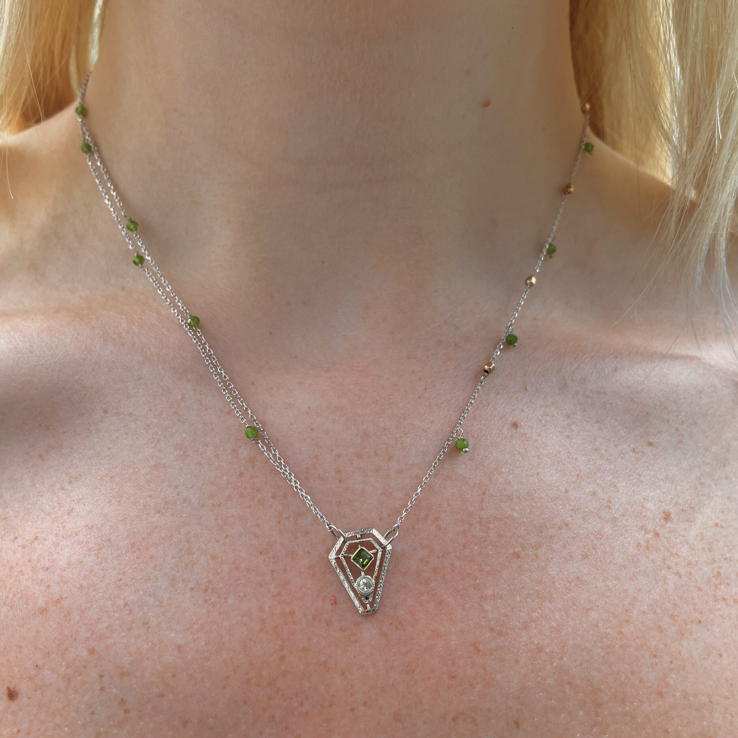 Estate: White Gold Three-Strand Emerald Necklace