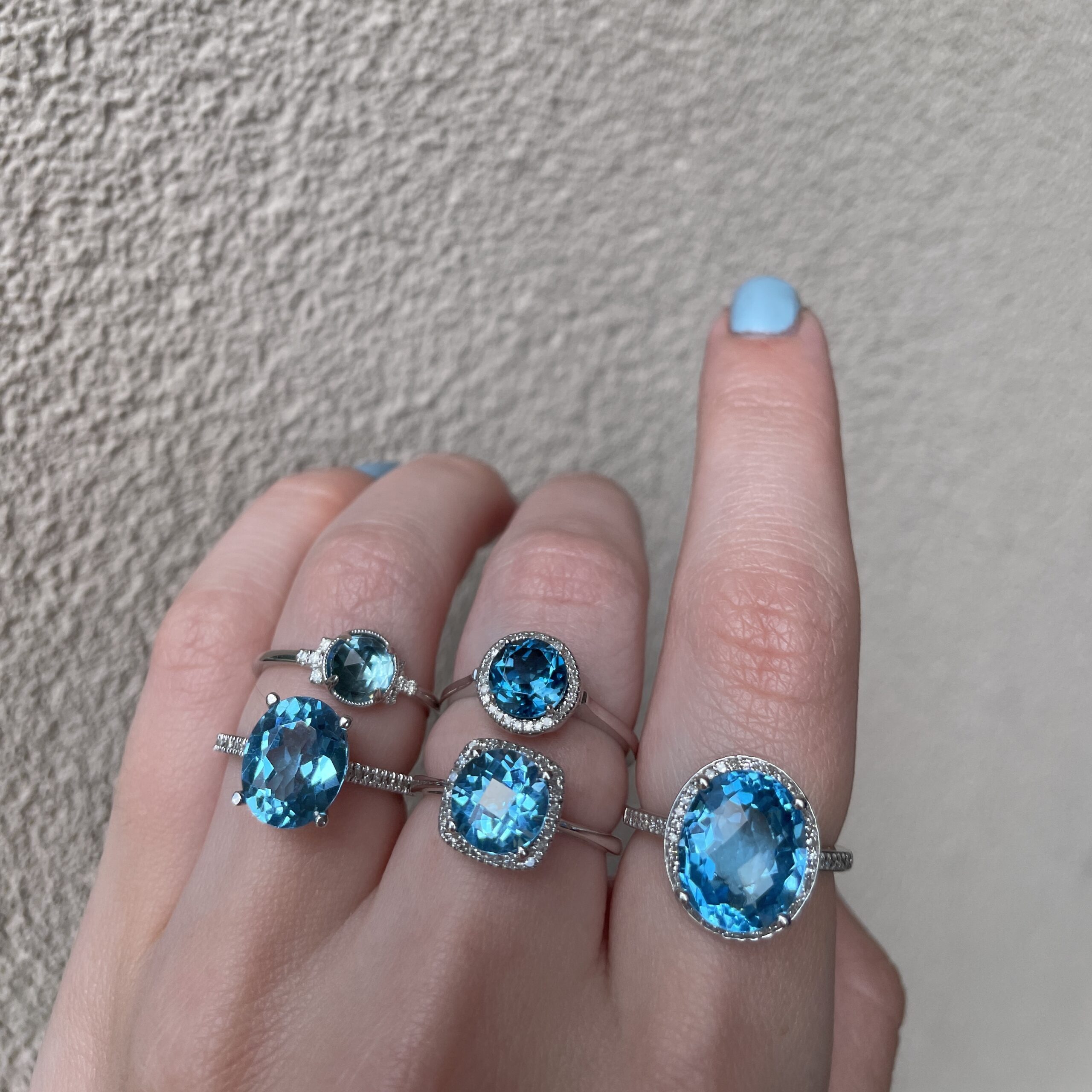 White Gold Blue Topaz and Diamond Oval Ring