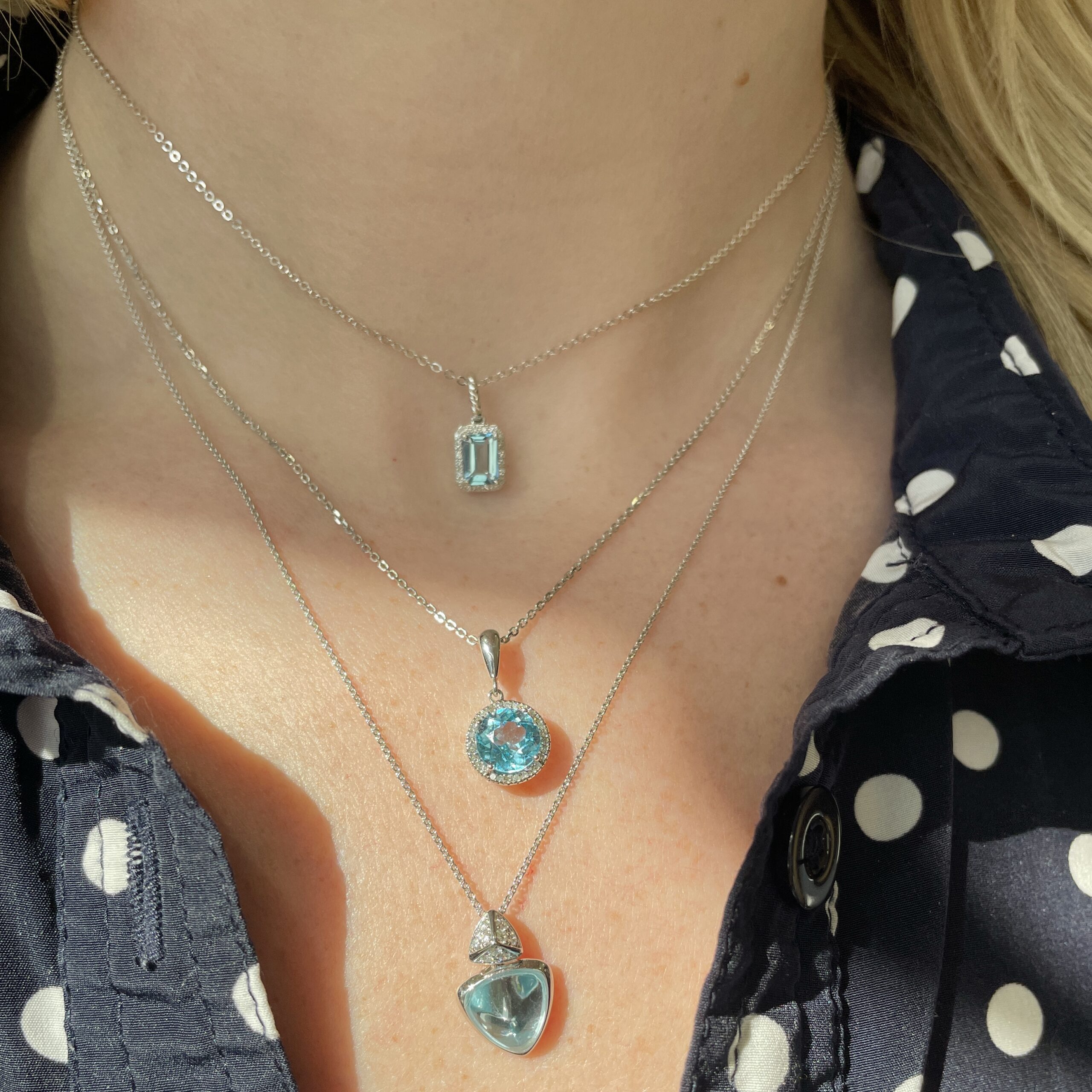 White Gold Blue Topaz and Diamond Round Pendant