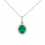 White Gold Emerald and Diamond Oval Halo Necklace