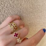 Yellow Gold Intertwining Round and Baguette Diamond Ring