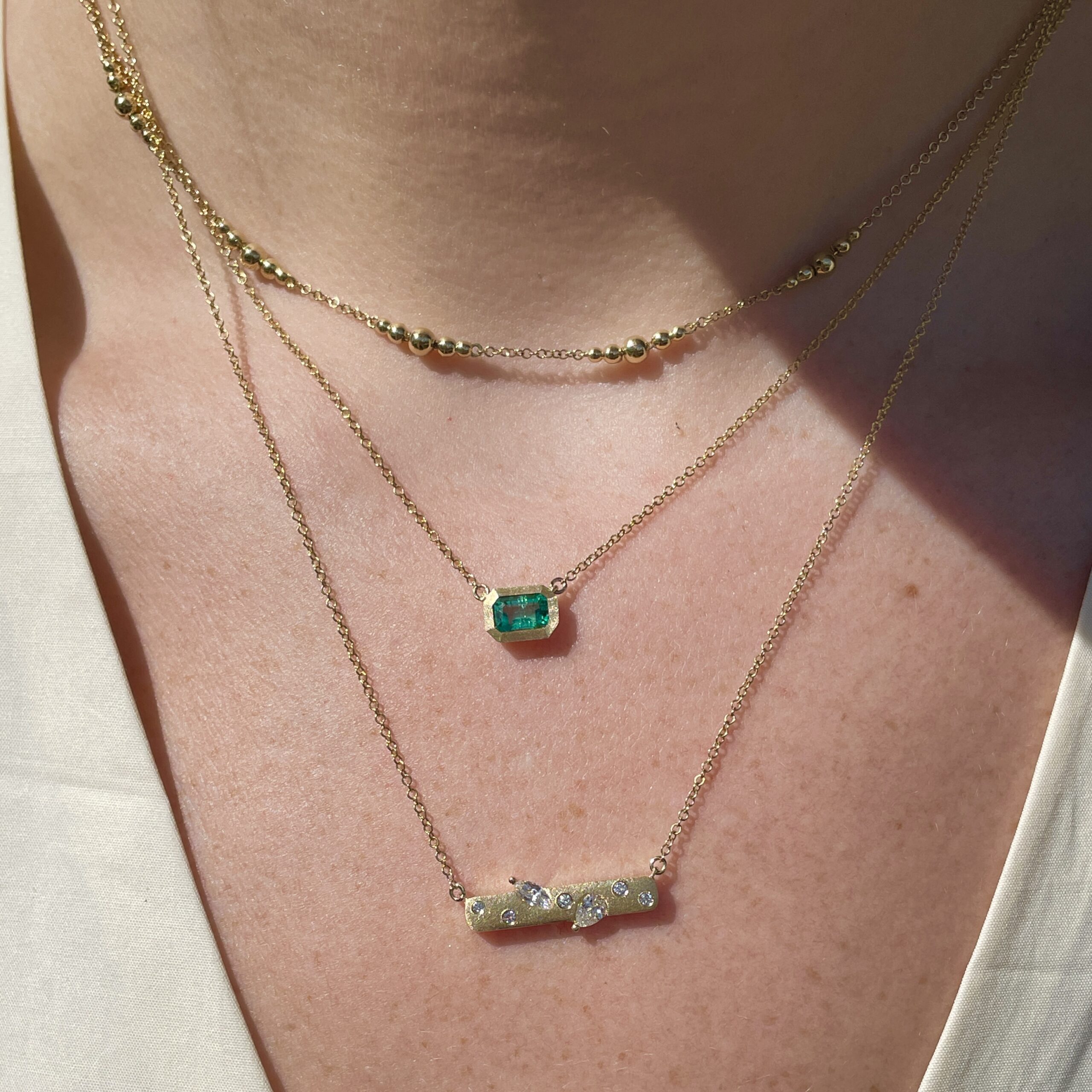 Brushed Yellow Gold Bezel Set Emerald Necklace