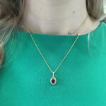 Yellow Gold Garnet and Diamond Oval Halo Necklace