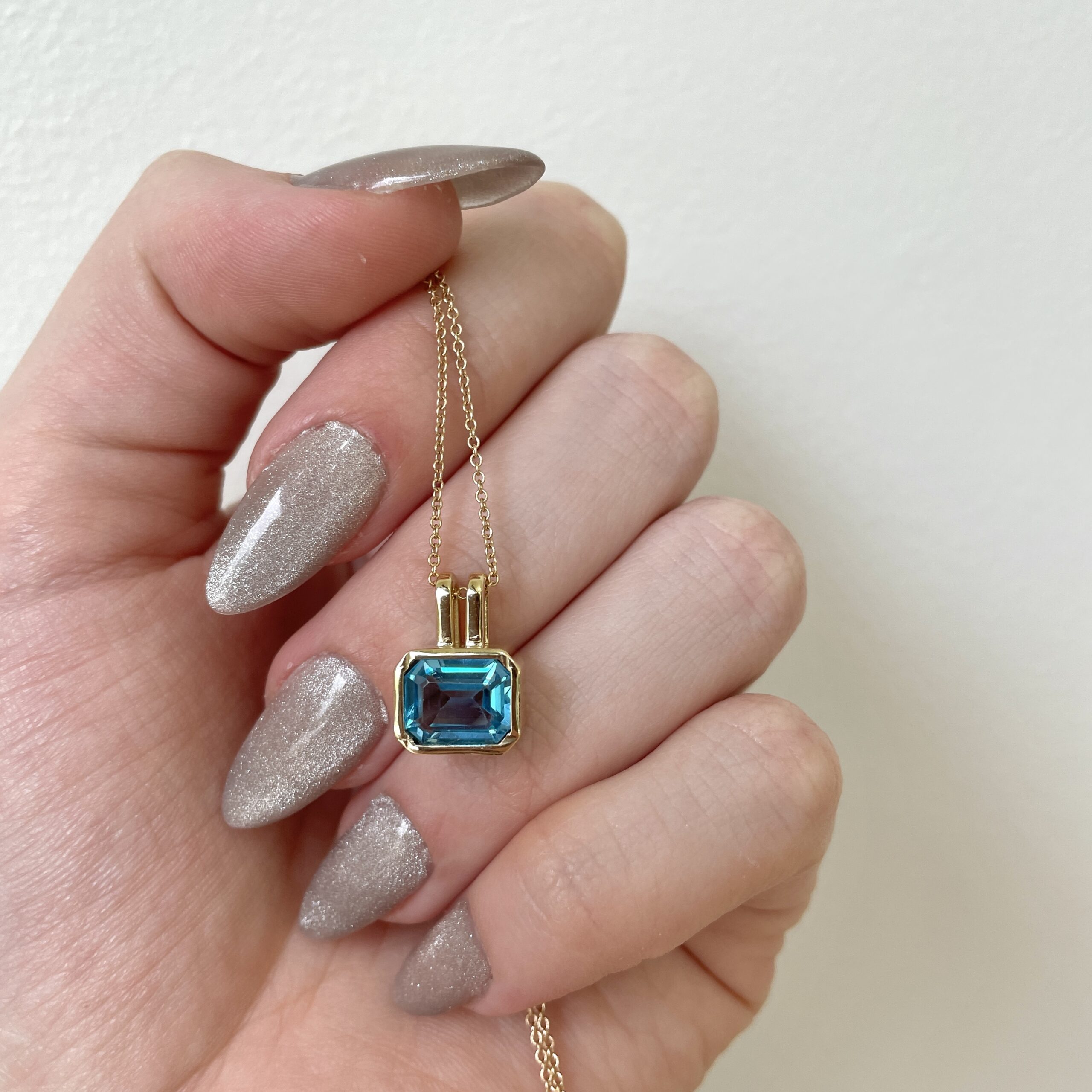 Yellow Gold Bezel Blue Topaz Pendant Necklace