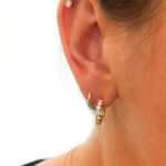 18 Karat Yellow Gold Huggie Hoop Earrings With Diamonds
