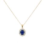 Yellow Gold Oval Sapphire Necklace with Diamond Halo