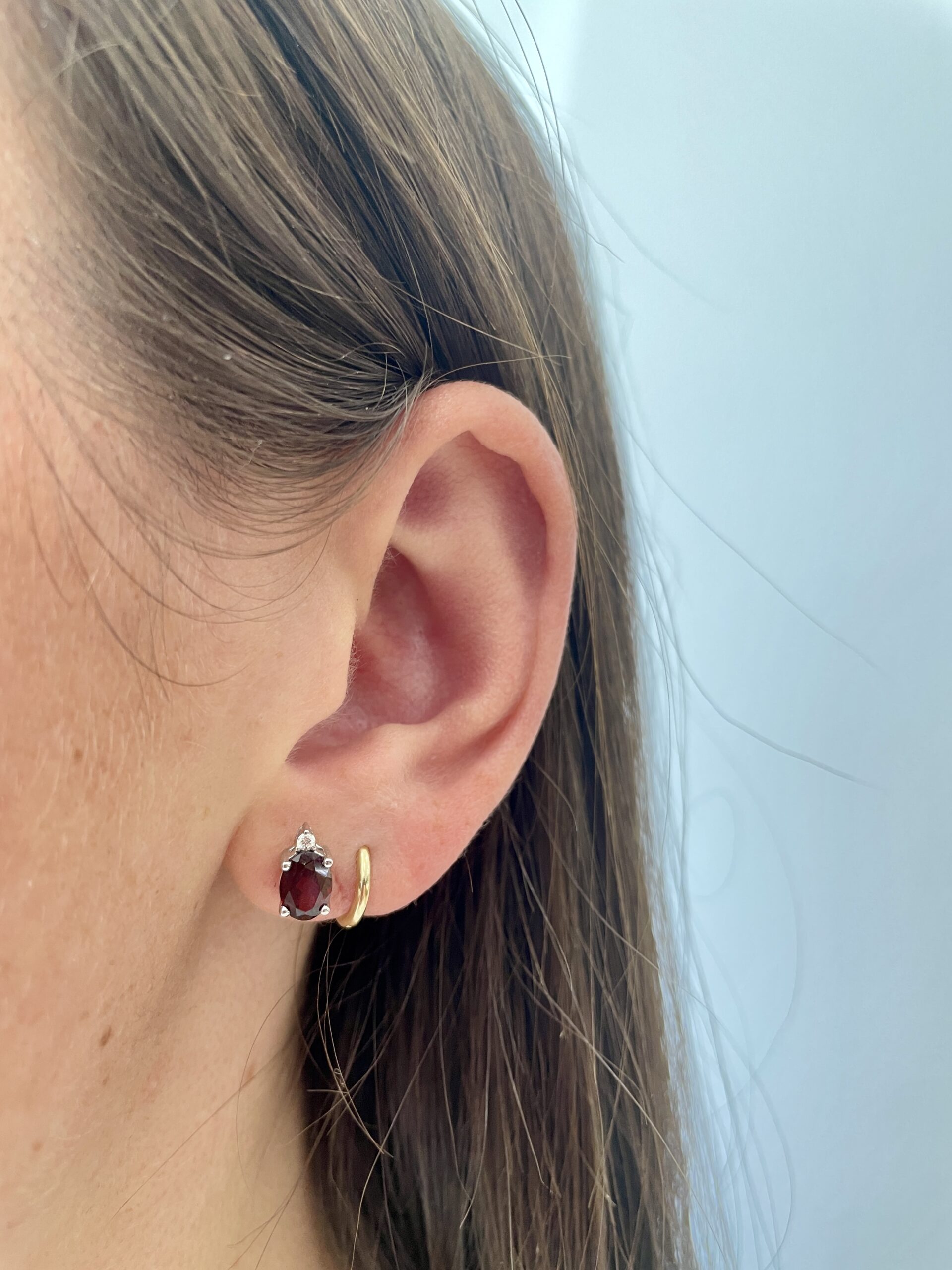 White Gold Garnet Stud Earrings with Diamonds