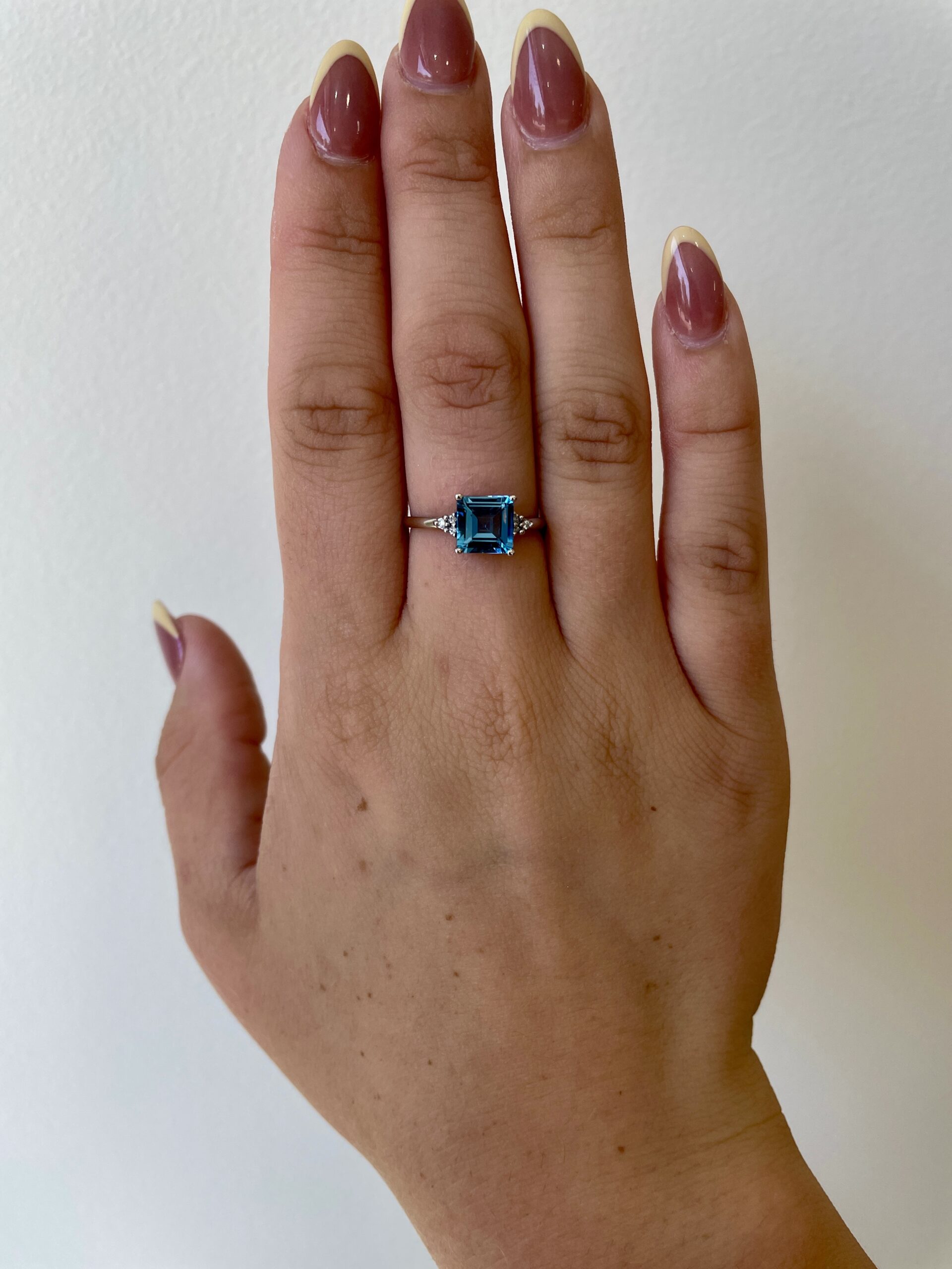 White Gold Blue Topaz Ring with Diamonds