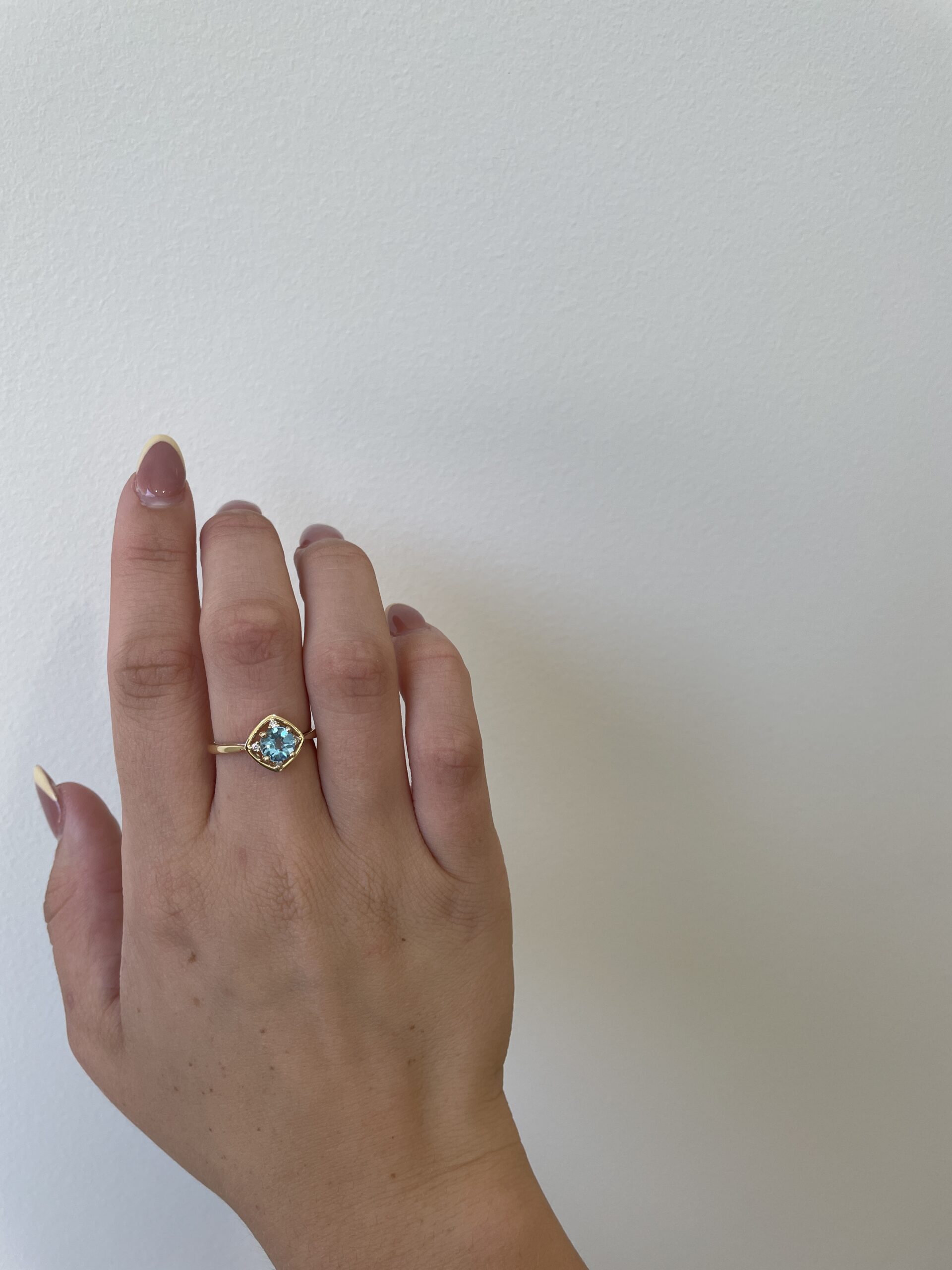 Yellow Gold Blue Topaz Ring with Diamonds