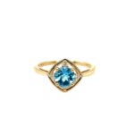 Yellow Gold Blue Topaz Ring with Diamonds