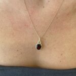 Yellow Gold Garnet Necklace with Diamond Halo
