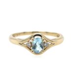 Yellow Gold Sky Blue Topaz Ring with Diamonds