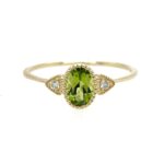 Yellow Gold Peridot Ring with Diamonds